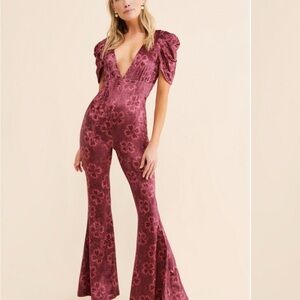 Free People Red Flare Rosaline Jumpsuit with Plunging Neckline